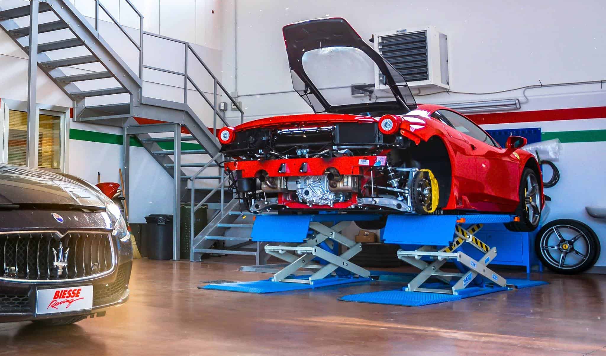 Biesse racing Ferrari on a lift