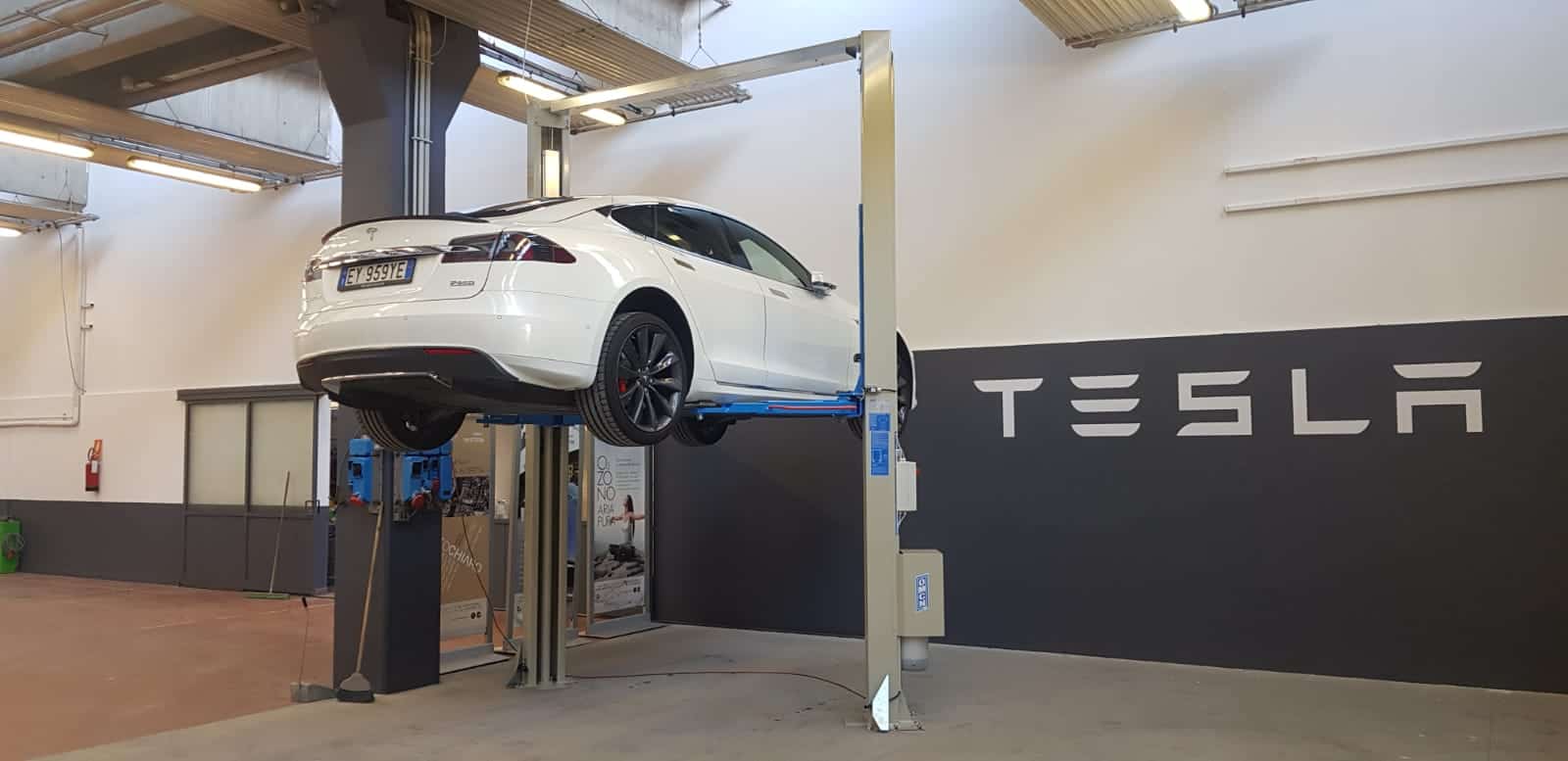 Tesla electric car on a lift
