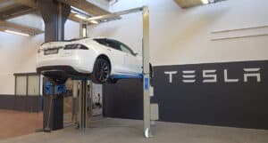 electric vehicle tesla on an OMCN lift